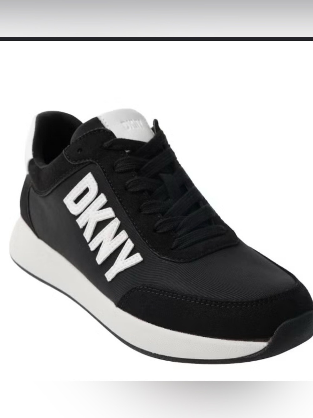 DKNY Black and White Logo Runner Sneakers
WORN ONCE